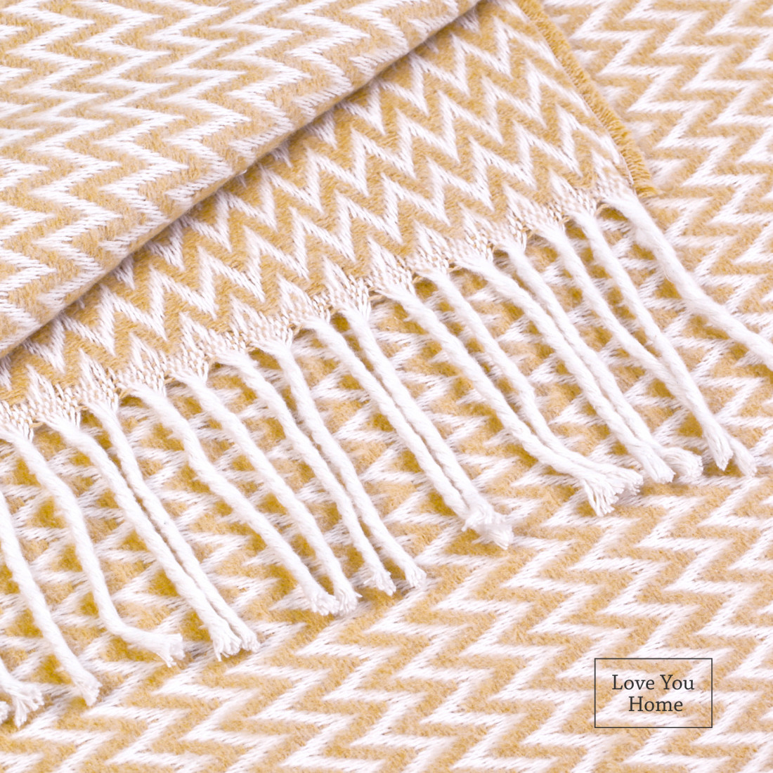 Cotton blanket with Chevron corners · 2